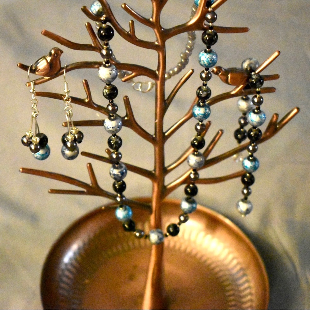 Handmade necklace, bracelet, and earrings set.